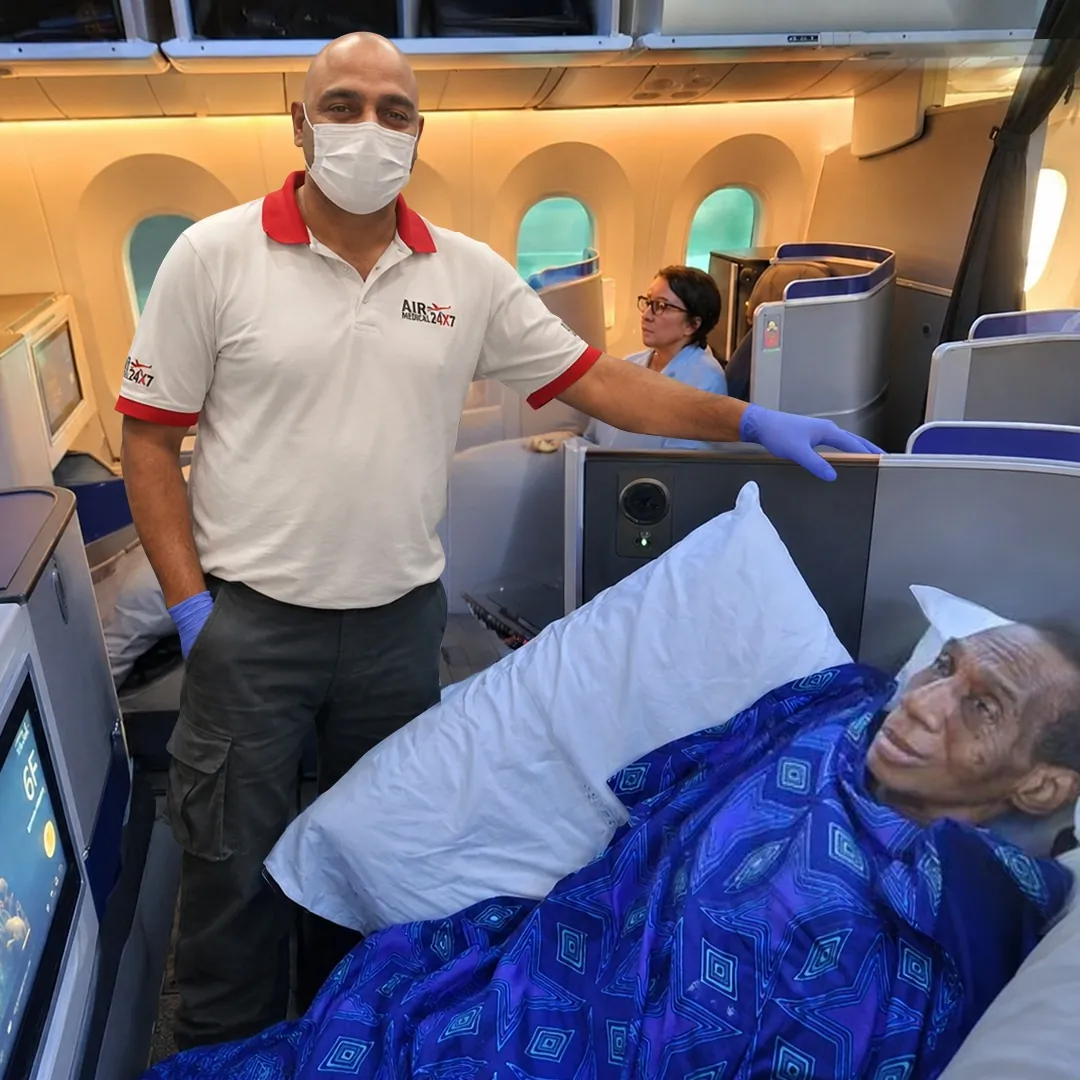 Flight medical escort team providing in-flight patient care on commercial aircraft