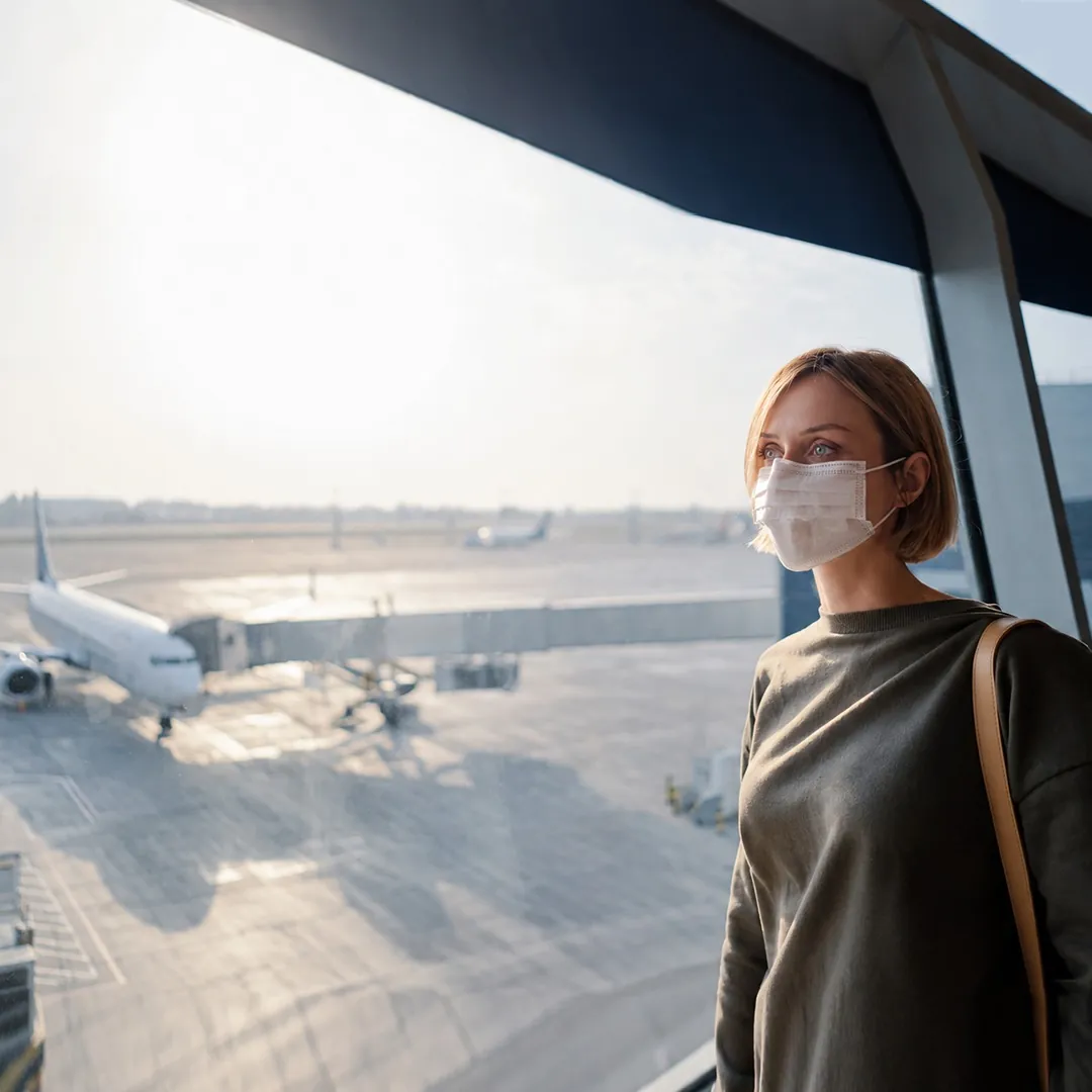 International medical tourism patient being transported with medical escort via air ambulance